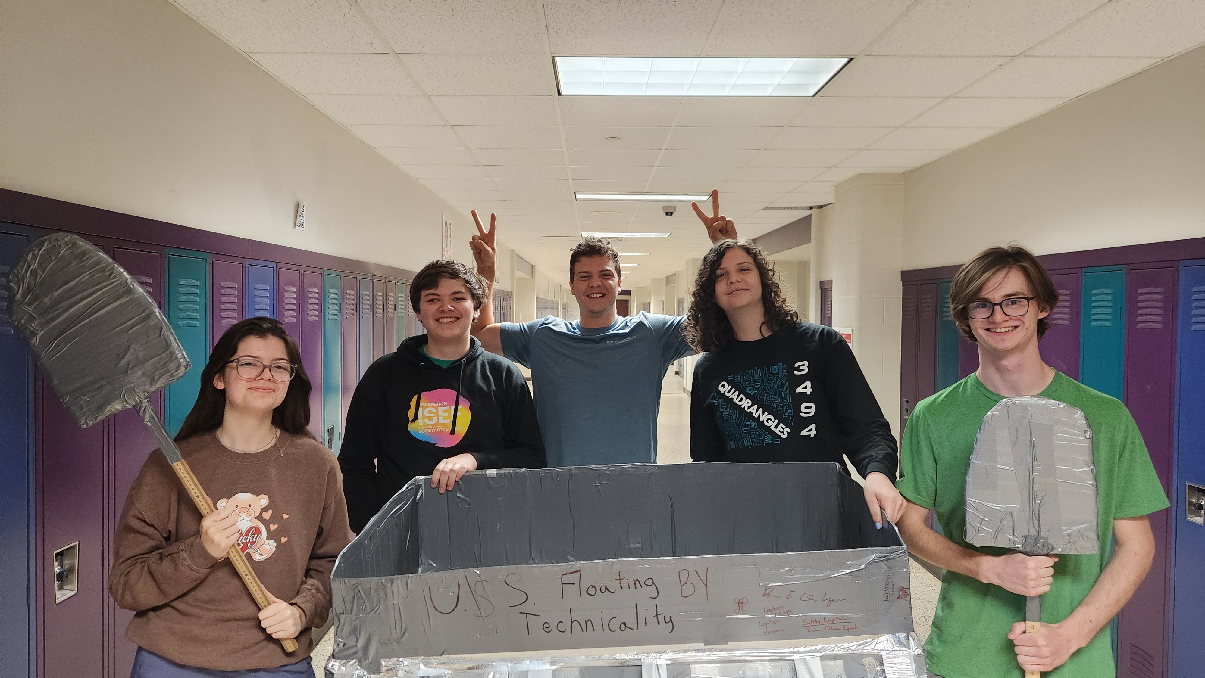 A boat we built out of cardboard and about 8 rolls of duct tape. The two of us holding the paddles were the crew. Some of the most fun I've had.
